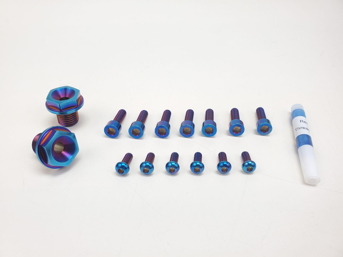 Titanium fork bolts kit for Surron and Talaria bikes, by Warp9Racing, featuring durable fasteners for motorcycle suspension.