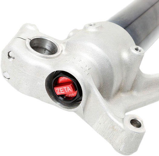 ZETA front fork bottom adjuster for Showa forks, part ZE56-20020, in black with metal components, showing detailed close-up.