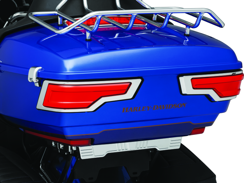 Kuryakyn Tracer Tour Pak rear lights with chrome finish and red lenses for Harley Davidson models, mounted on luggage trunk.