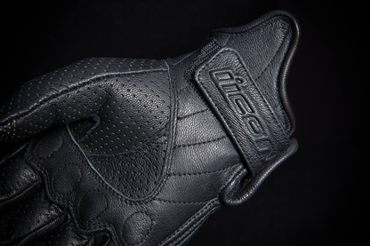 Black ICON Women's Pursuit Classic™ perforated gloves in XL size, showcasing breathable design and textured grip surfaces.
