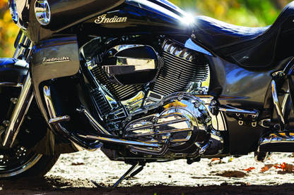 Kuryakyn chrome cylinder base cover for Indian Motorcycle models, showcasing a sleek, polished finish on the engine components.