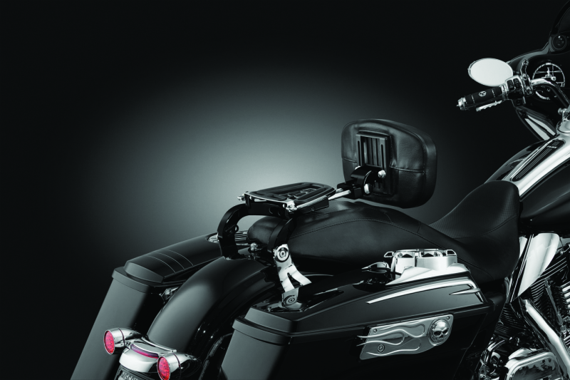 Kuryakyn Multi-Purpose Backrest with luggage rack installed on a powersports vehicle, showing sturdy construction and padded back support.