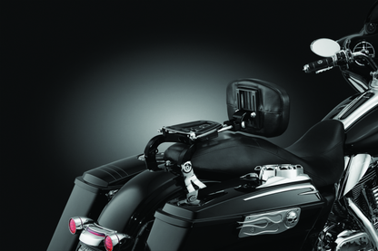 Kuryakyn Multi-Purpose Backrest with luggage rack installed on a powersports vehicle, showing sturdy construction and padded back support.