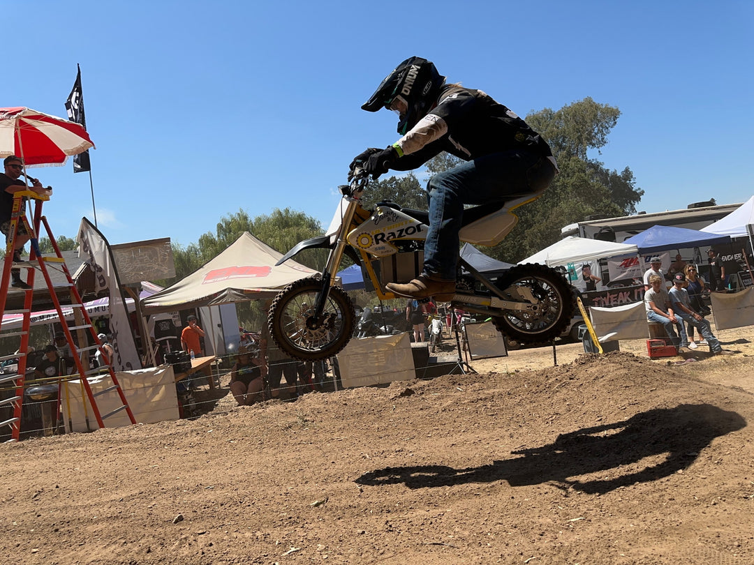 Electro & Co Razor MX500 MX650 SX500 billet aluminum swingarm extension with axle block system, offering 2-3 inch stretch for dirt bikes.