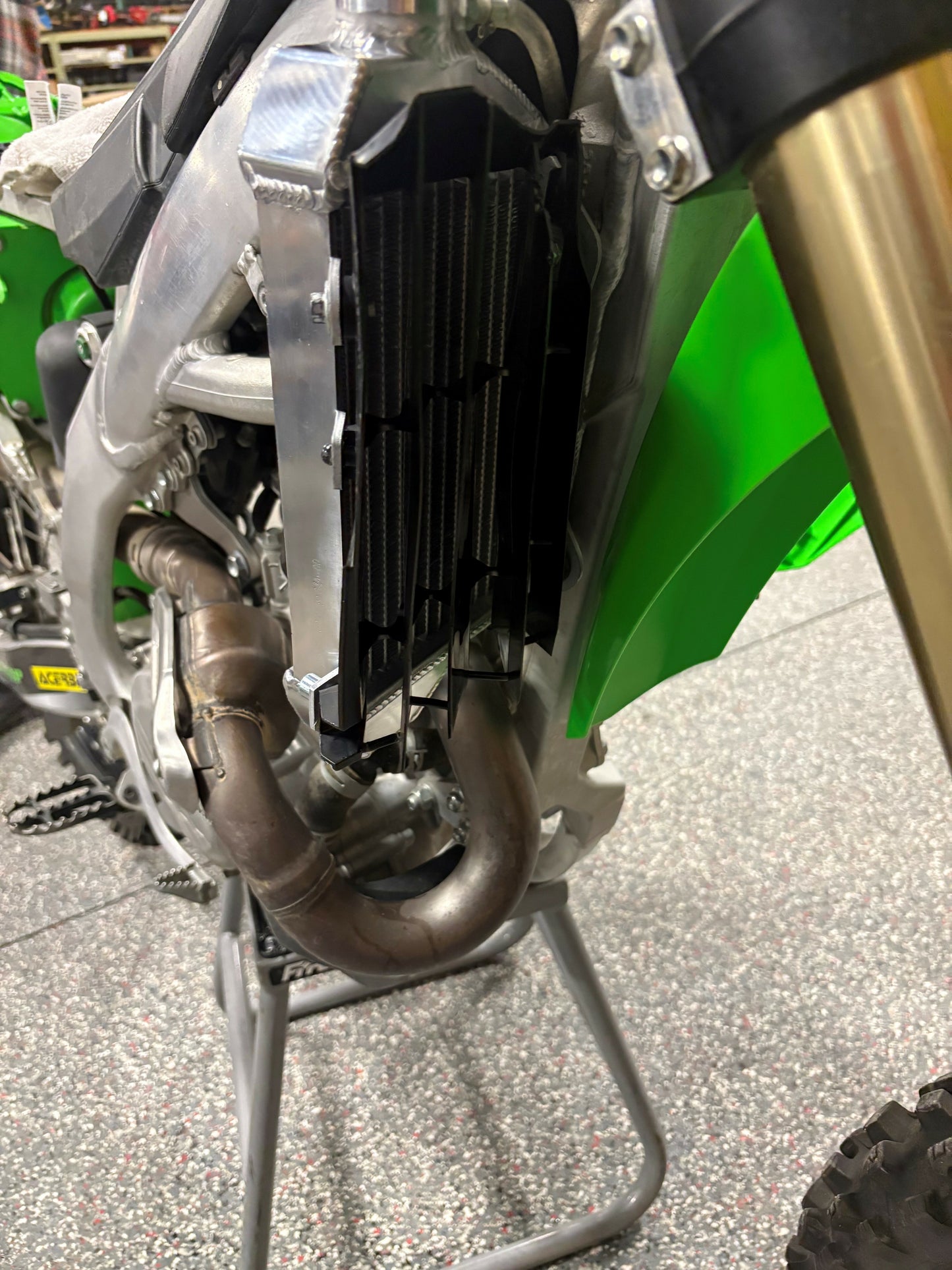 Fire Power TRS-R-140R radiator right for Kawasaki, high-performance aluminum replacement with sleek design and durable construction.