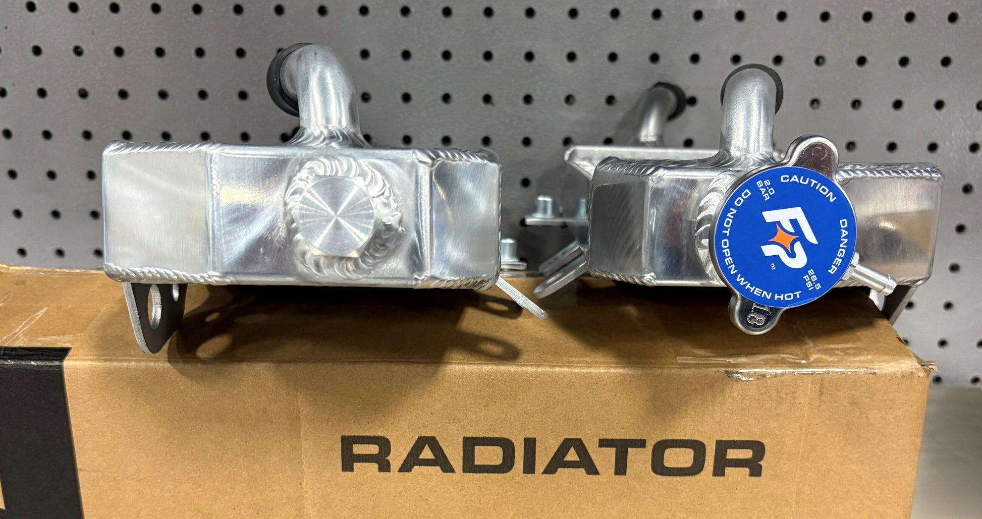 Fire Power TRS-R-140R radiator right for Kawasaki, high-performance aluminum replacement with sleek metallic finish.