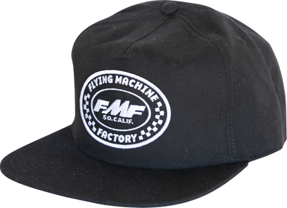 Black FMF Factory Flag Hat featuring the FMF logo and adjustable strap, designed for a stylish and comfortable fit.