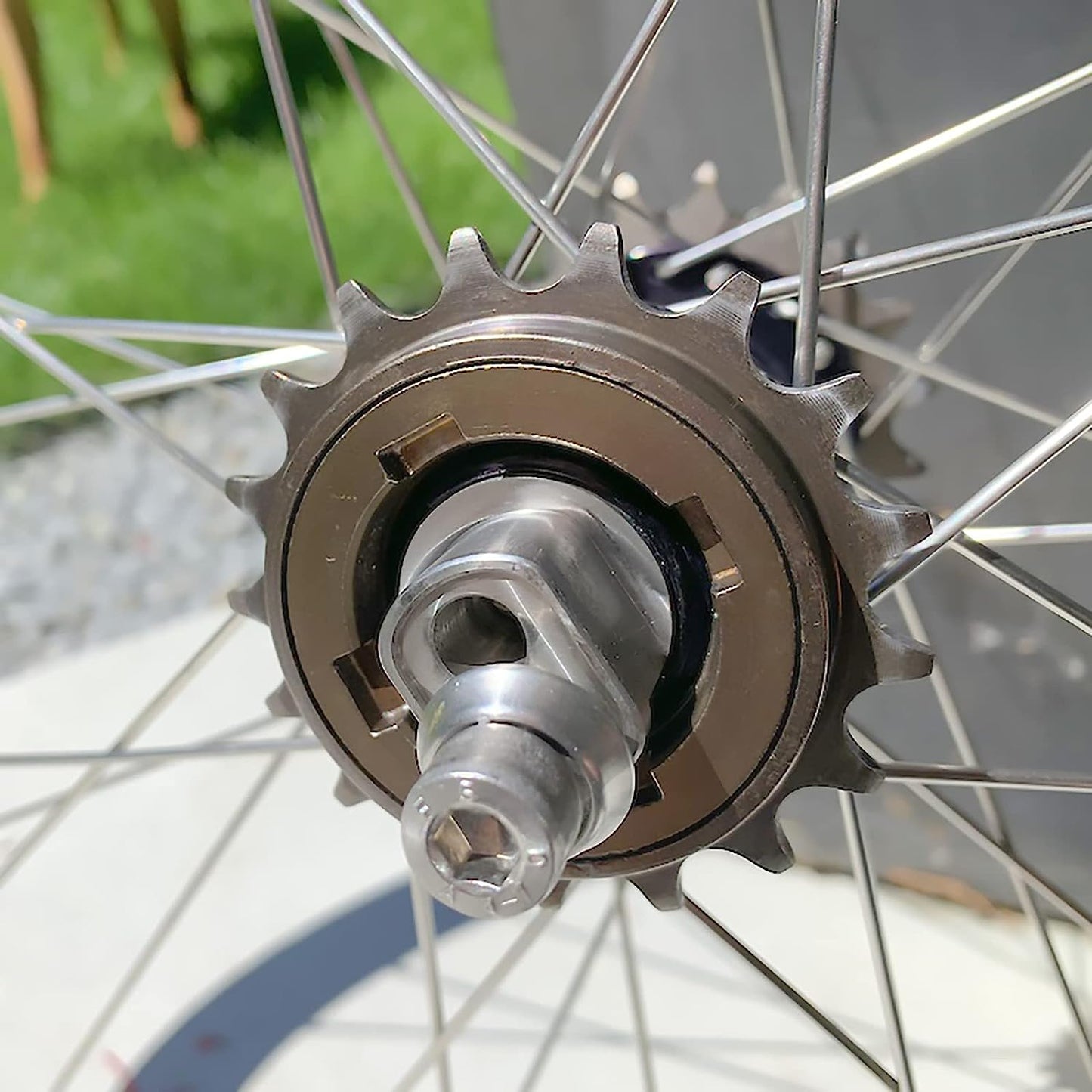 Black Hycline 18T single speed bike freewheel for bicycle cassettes and freewheels, showing the gear teeth and brand markings.