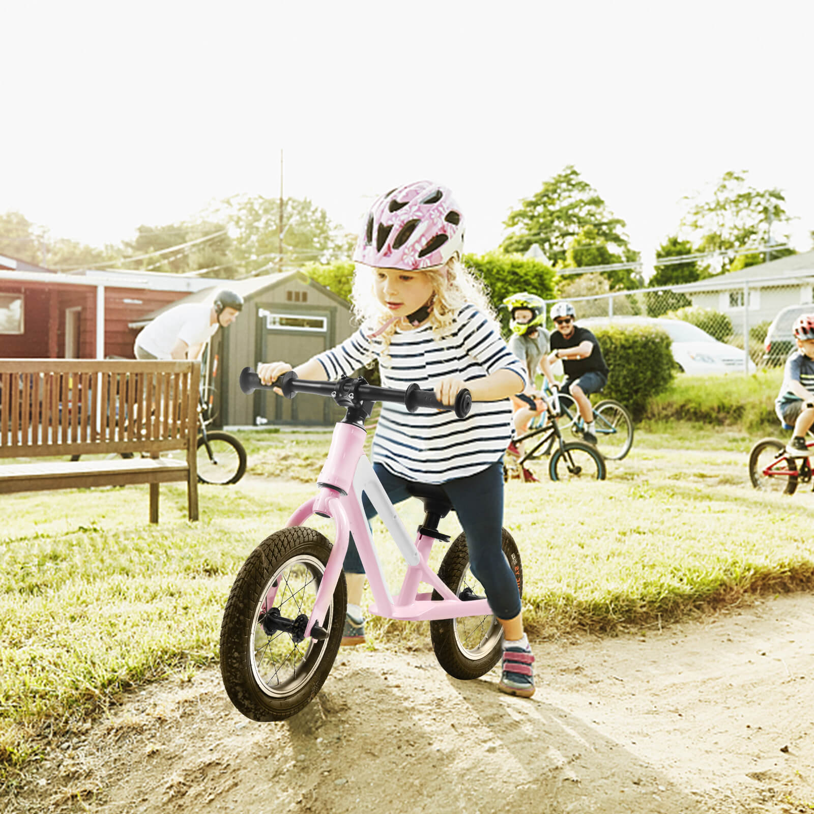 Black Hycline ChopShip 12-inch baby balancing bike with training wheels and ergonomic handlebars for young children.