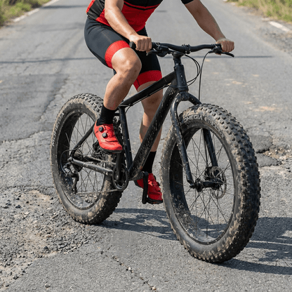 Hycline Rock Conqueror E-Bike and Fat Bike Tire 20x4 with 40 PSI, durable all-terrain rubber tread for off-road riding.