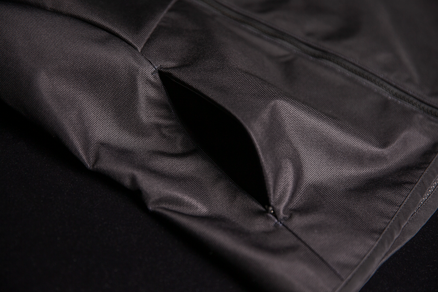 Black ICON Women's Airform™ Jacket in XL laid flat showing front view with zip closure and collar detail.
