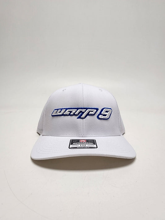 White and blue WarpWear W9 hat with adjustable strap and embroidered Warp9Racing logo, stylish apparel for racing fans.
