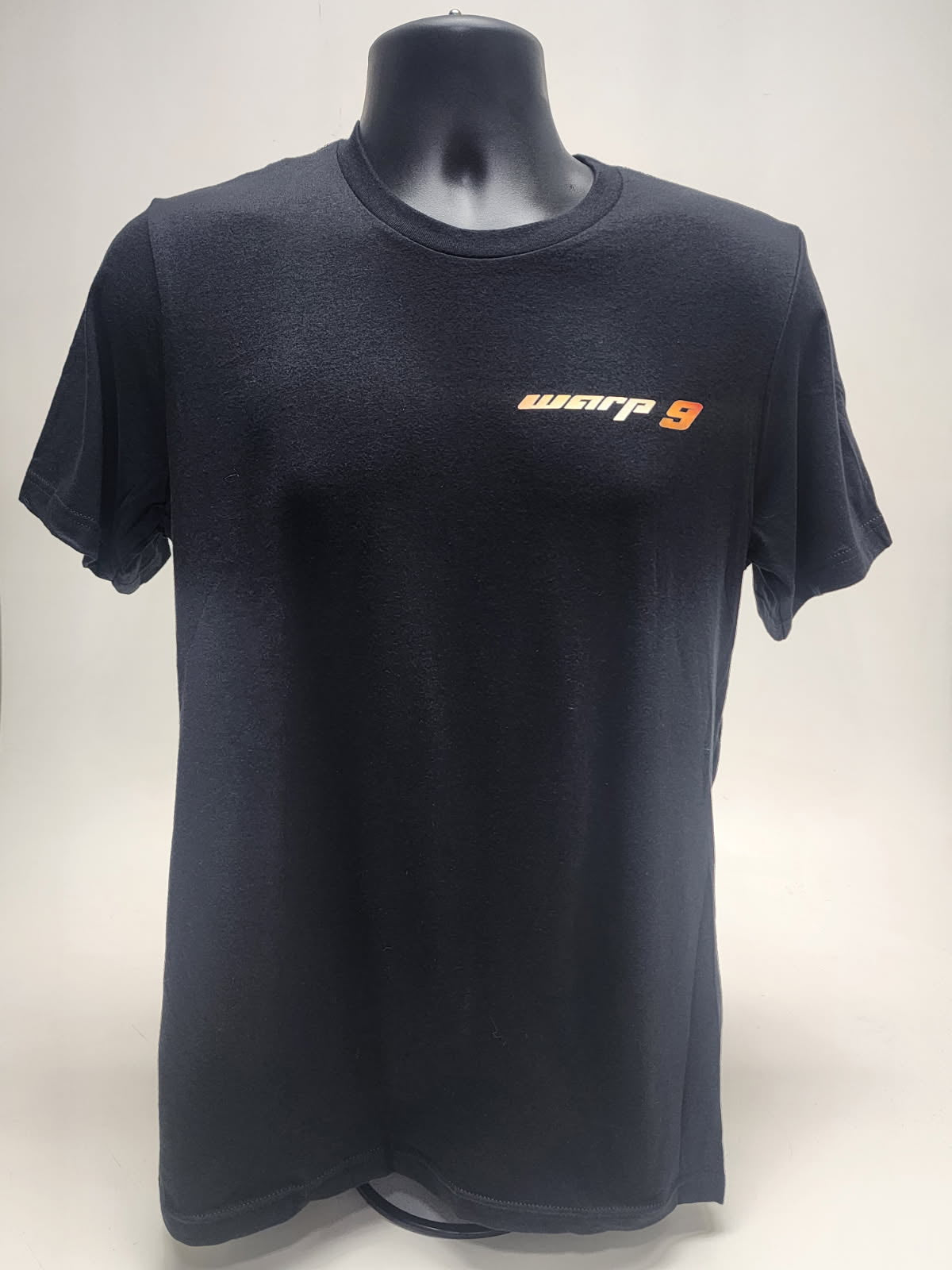 Warp9Racing short sleeve T-shirt in black with logo, casual apparel made by WarpWear, displayed on a plain background.