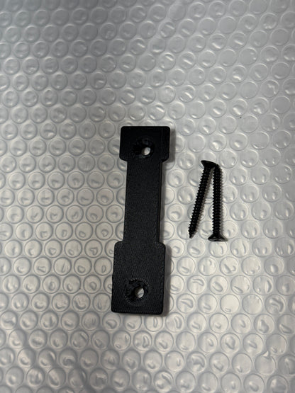 McCoy Industries extra wall mount plate for helmet mount system, accessory used for securing helmet accessories on walls.