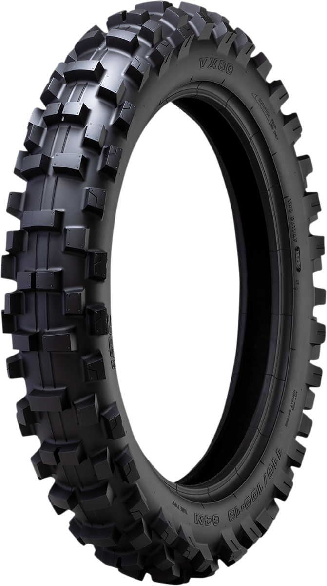 IRC VX-30 rear motorcycle tire 110/90-19 62M T10558 mounted on motorcycle wheel, showcasing tread pattern and sidewall details.