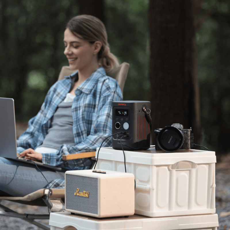 Jackery Explorer 300D portable power station with multiple outlets and compact design for outdoor and emergency use