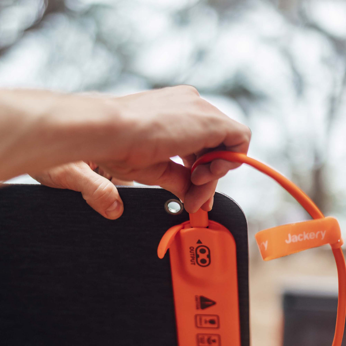 Jackery Solar Panel Connector for handbags, featuring a compact design and durable construction for portable solar charging accessories.