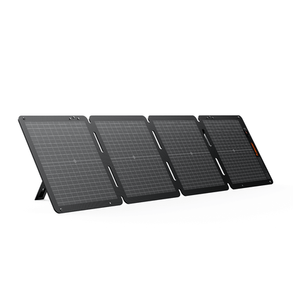 Jackery SolarSaga 100 Air portable solar panel outdoors in sunlight, compact and lightweight design for outdoor power generation