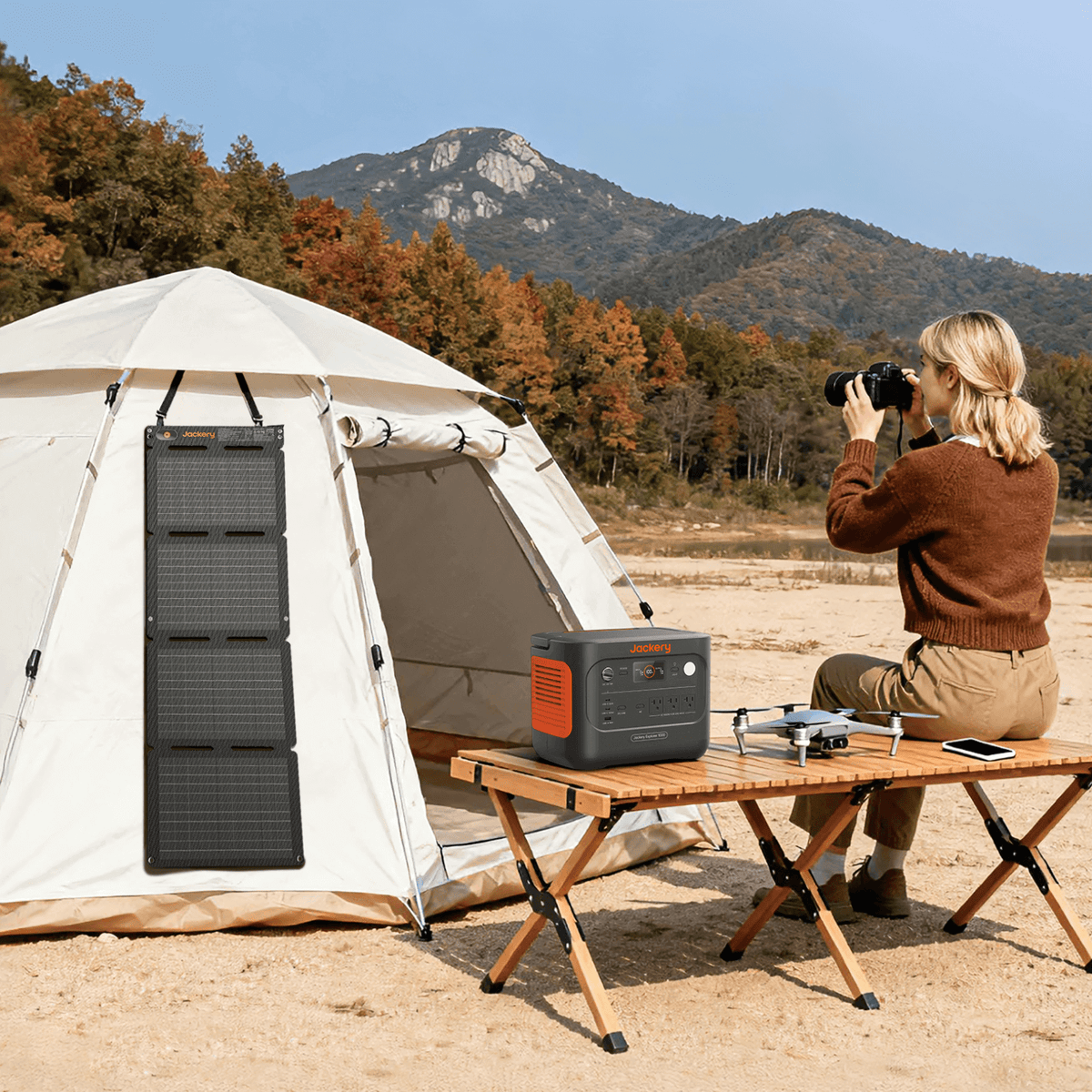 Jackery SolarSaga 40 Air portable solar panel outdoors, showing its compact design and solar cells for renewable energy.