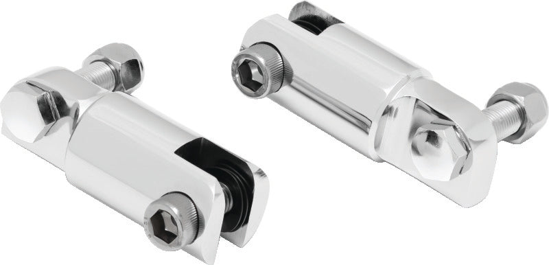 Kuryakyn chrome stirrup heel rest extenders adding 2-1/4 inches for increased comfort and heat protection on motorcycle footrests