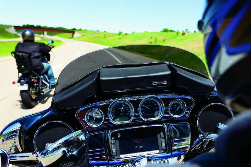 Kuryakyn Batwing Fairing Pouch Bag for Harley Davidson 2014-2015 models, mounted on bike's fairing for storage.