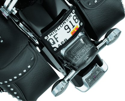 Kuryakyn Curved Laydown License Plate Frame for Honda VTX1800 bikes in glossy black, designed for a sleek motorcycle look.