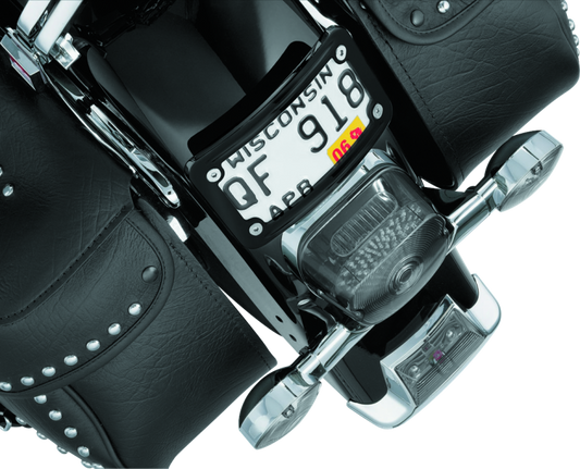 Kuryakyn Curved Laydown License Plate Frame for Honda VTX1800 bikes in glossy black, designed for a sleek motorcycle look.