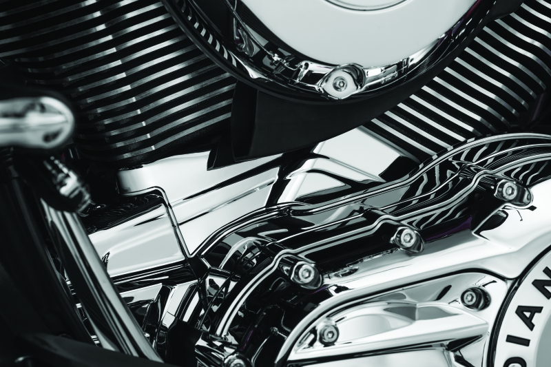 Kuryakyn Chrome Cylinder Base Cover for Indian Motorcycle Models, part 5737, showcasing shiny chrome finish and detailed design.