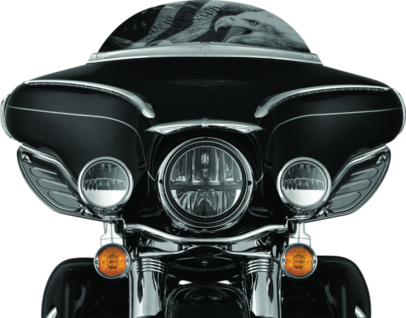 Kuryakyn Dragon Wing Air Deflectors in dark smoke mounted on Harley Davidson FLHX and FLHT models, showcasing sleek motorcycle accessories.