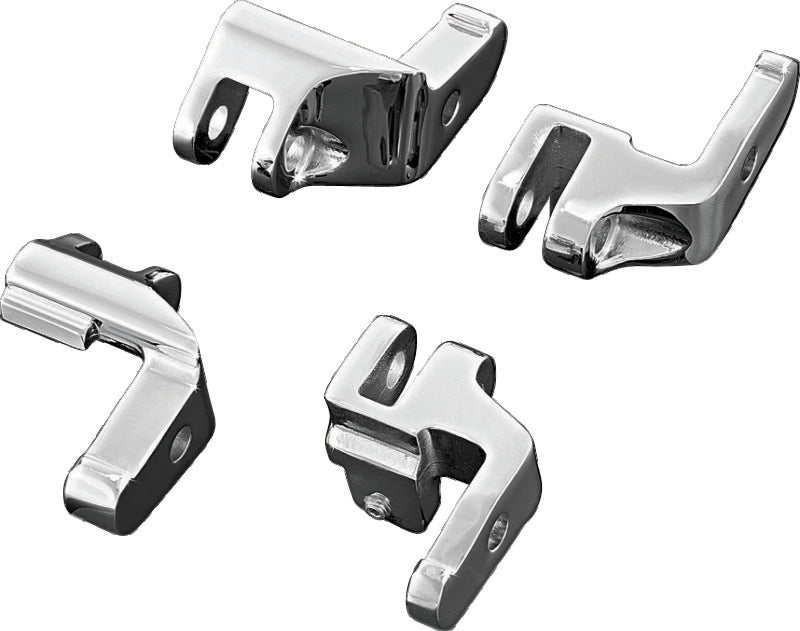 Chrome Kuryakyn floorboard relocator brackets for 1997-2016 Harley-Davidson Touring models, part #4588, shown installed on motorcycle.