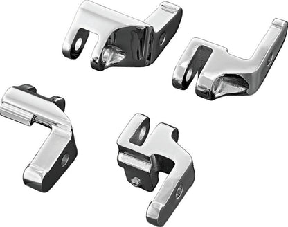 Chrome Kuryakyn floorboard relocator brackets for 1997-2016 Harley-Davidson Touring models, part #4588, shown installed on motorcycle.