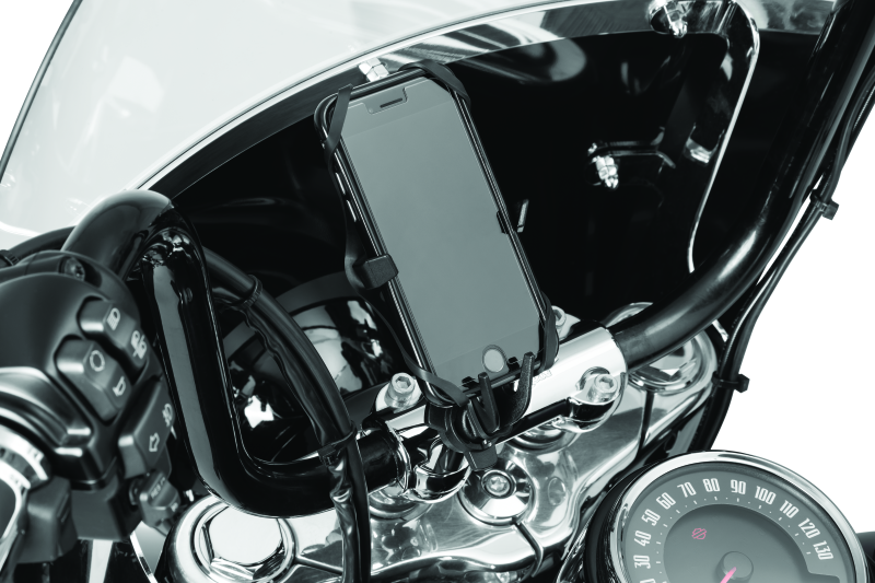 Black Kuryakyn Free-Flex device holder handlebar clamp mount attached to motorcycle handlebar, part #6438.