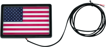 Kuryakyn Freedom Flag LED light in black, 4x6 inches, designed for powersports vehicles, featuring a flag design and LED illumination.