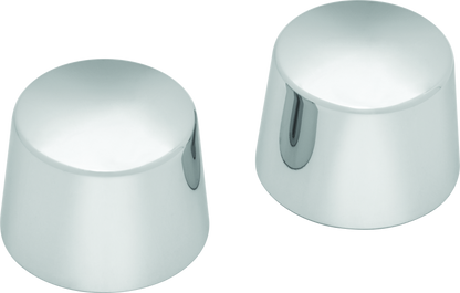 Kuryakyn chrome front axle nut caps for Harley Davidson touring models, shown installed on motorcycle wheel.