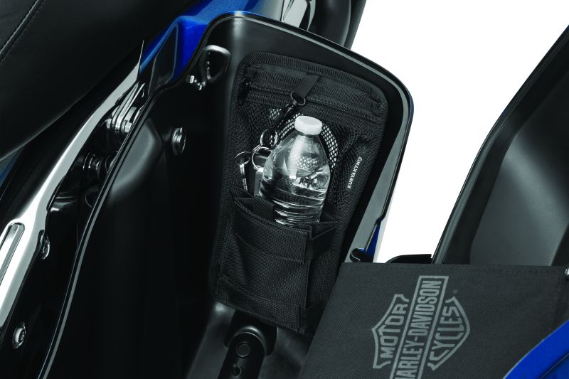 Kuryakyn Internal Saddlebag Organizer for powersports vehicles, showing the durable black plastic storage compartment inside a saddlebag.