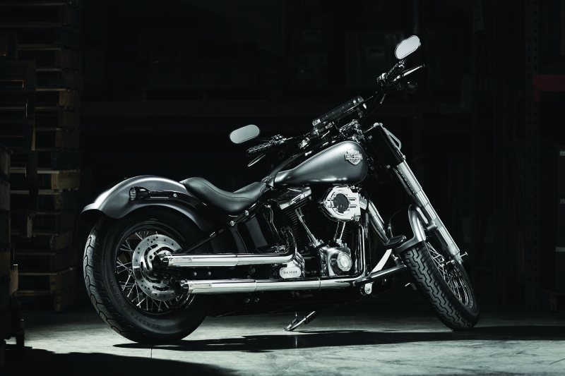 Kuryakyn ISO grips without throttle boss for throttle-by-wire systems in black, shown on a motorcycle handlebar.