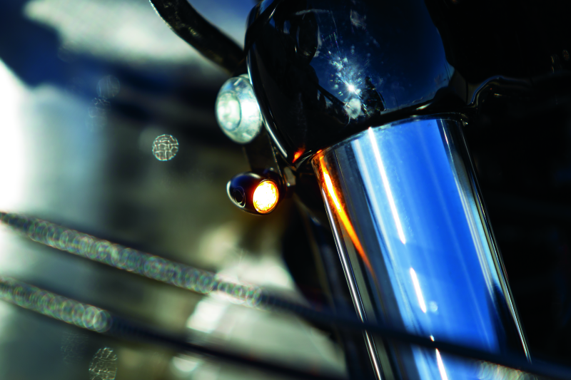 Kuryakyn Kellermann Atto clear lens amber motorcycle LED indicator lights in satin black, compact and sleek for motorcycle signaling.