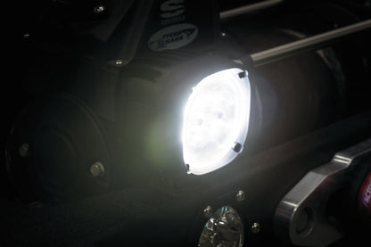 Kuryakyn Lodestar 1850L high-output spot beam driving lights for powersports vehicles, shown mounted on a vehicle.