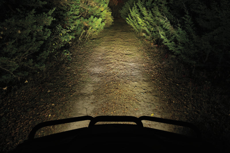 Kuryakyn Lodestar 1850L Spot Beam high-output driving lights for powersports vehicles, mounted on a motorcycle or ATV.