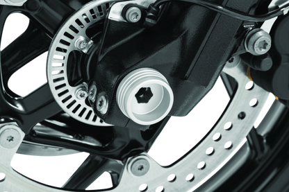 Kuryakyn Lodestar front axle slider in silver for BMW R1200R, R1200RS, and F800R motorcycle, showing the sleek protective part.