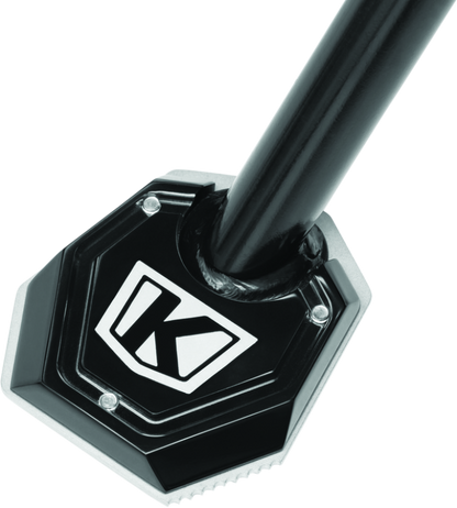 Black Kuryakyn Lodestar Kickstand Shoe for BMW R1200GS motorcycle, part #3838, providing enhanced stand stability and support.