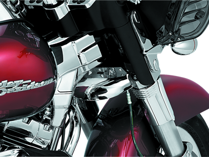 Kuryakyn lower tree wind deflector in chrome mounted on Harley-Davidson touring motorcycle, designed to reduce wind turbulence.