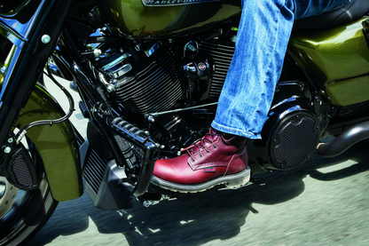 Kuryakyn Mesh Derby Cover in black for Harley-Davidson Touring models, part #6527, shown on motorcycle engine.