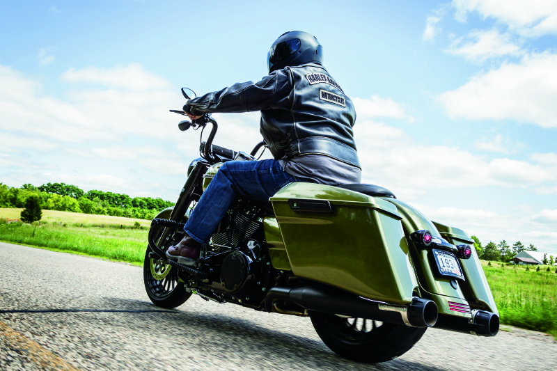 Kuryakyn Mesh Derby Cover in black for Harley-Davidson touring models, part #6527, shown on a motorcycle engine.