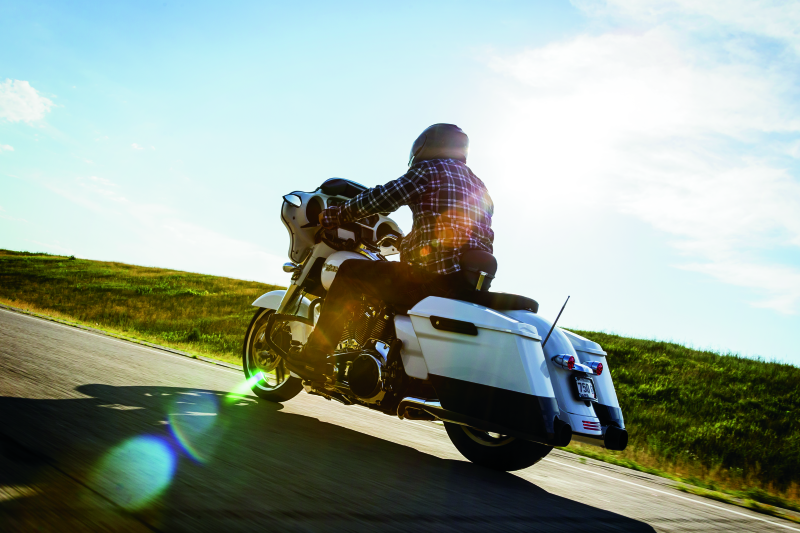 Kuryakyn Mesh Derby Cover Black for Harley-Davidson Touring Models, showcasing the sleek black metal design with intricate mesh pattern.