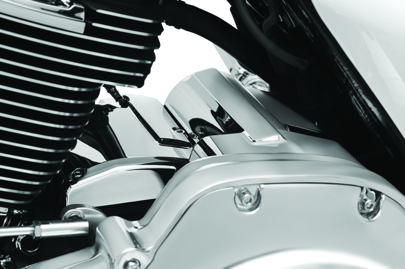 Kuryakyn Milwaukee-8 chrome starter cover for Harley-Davidson models, shiny and detailed, fits Milwaukee-8 engine bikes.