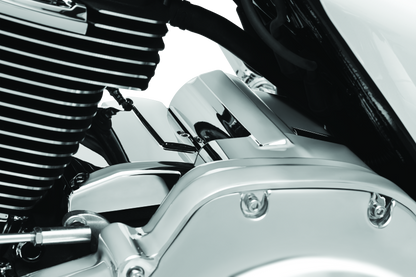 Kuryakyn Milwaukee-8 chrome starter cover for Harley-Davidson models, shiny and detailed, fits Milwaukee-8 engine bikes.
