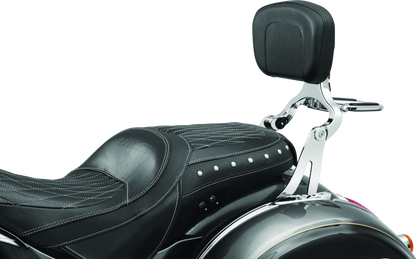 Kuryakyn Multi-Purpose Backrest with Luggage Rack mounted on motorcycle seat, featuring padded backrest and durable luggage rack.