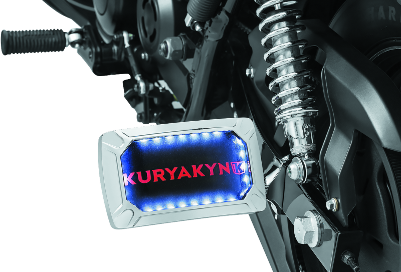 Kuryakyn Nova curved horizontal side license plate holder with integrated LED lighting for motorcycles.