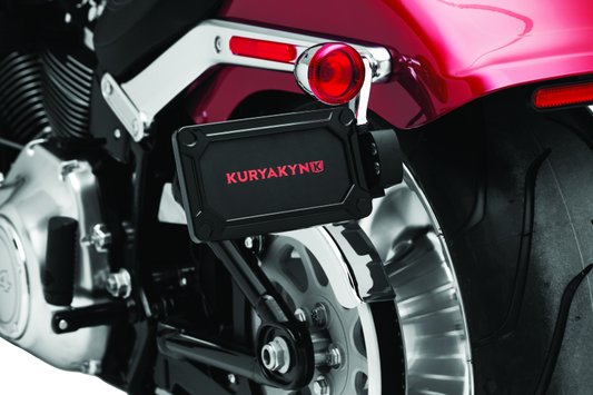 Kuryakyn Nova side mount license plate frame for Harley Davidson in gloss black, made of durable metal with mounting hardware